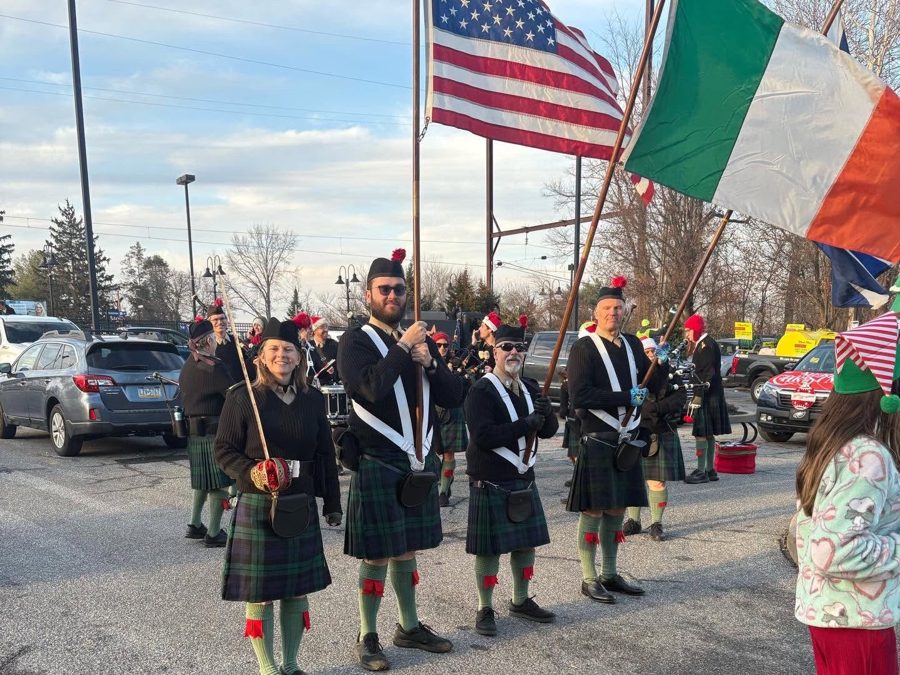 The color guard carrying the American, Irish and Scottish flags
