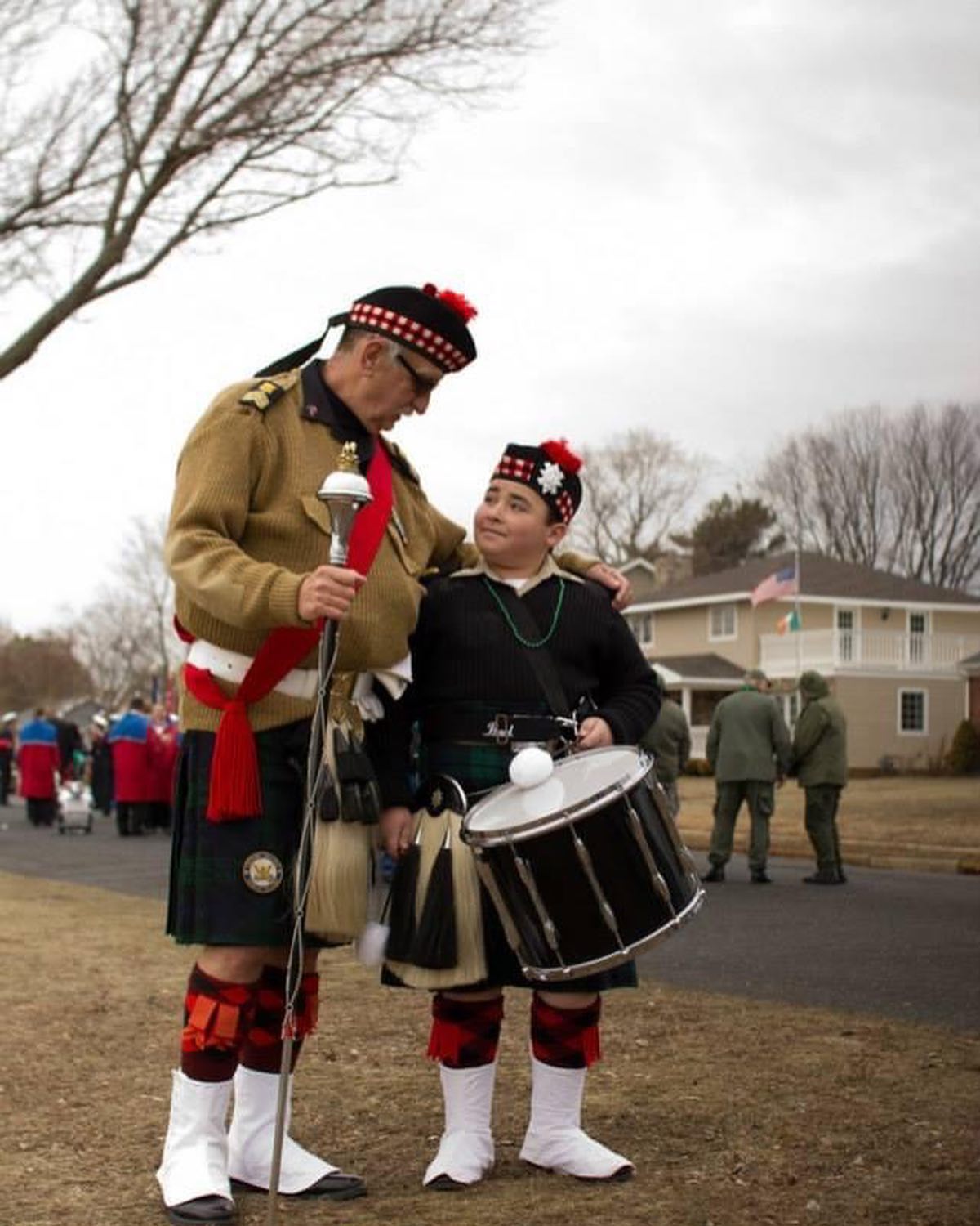 Experienced Drum major offering advice to young drummer